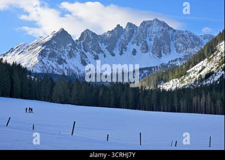 Triebental, Styria, Austria - January 31, 2024 - Ski tourers at morning start a mountain hike in icy cold winter temperatures. Stock Photo