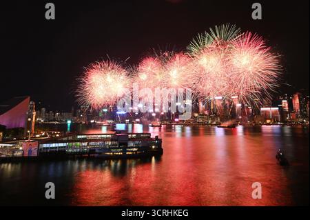 Fireworks exploding over Victoria Harbor on October 1, 2026 in Hong ...