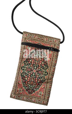Handmade embroidered fabric phone bag with laces isolated on white background Stock Photo