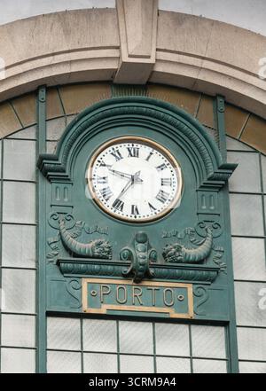 Clock within Porto railway station, Portugal Stock Photo
