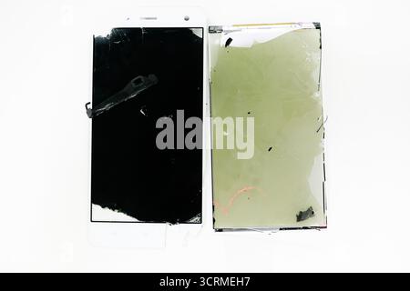 close up broken hardware component of LCD  and touchscreen smartphone isolated on white background Stock Photo
