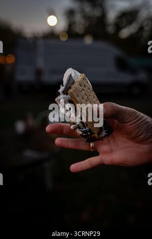 Camp fire s'mores on an autumn night Stock Photo