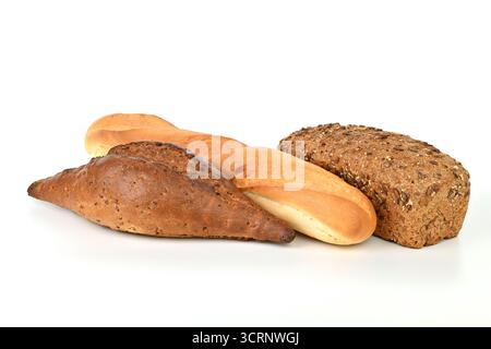 Three different types of bread are displayed on a white background. The breads are all different shapes and sizes, with one being a long roll, another Stock Photo