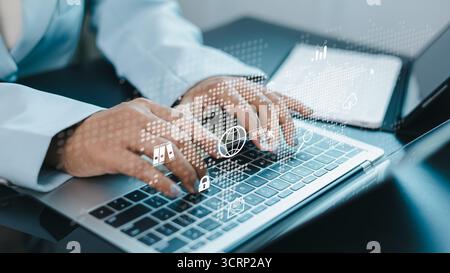 Close-up of businesswoman typing on laptop with global digital icons, cyber security, cloud computing, and online business technology concept. Stock Photo