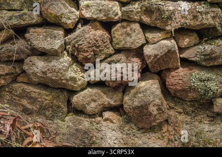 A section of a very old stone wall used as a fence in the past, in the eastern Andean mountains of central Colombia, near the village of Cucaita. Stock Photo