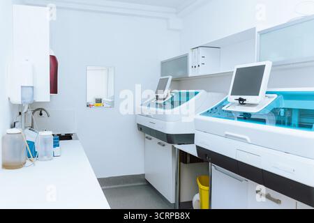 High-tech laboratory featuring advanced machines and tools for scientific research, showcasing a tidy environment. Stock Photo