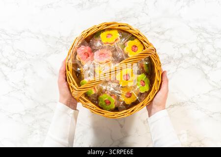 Wrapped Flower Cookies in Easter Basket Stock Photo