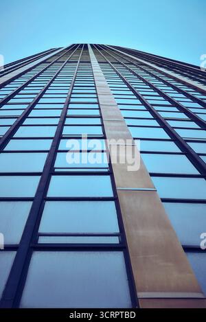 Modern Skyscraper Reaching into the Blue Sky with Fluffy Clouds Stock ...
