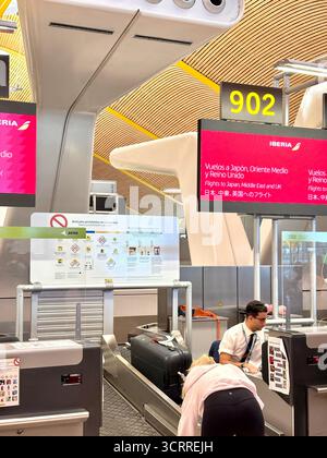 Iberia airlines check in desks, Adolfo Suarez Madrid international airport, Stock Photo