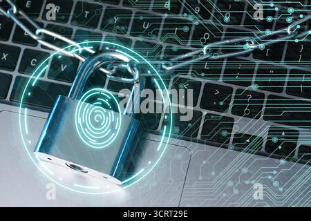 Padlock with digital fingerprint scan and chain on laptop. Circuit board pattern. Cyber security Stock Photo