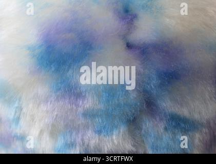 Close up textured background of blue and white fluffy plush material fabric Stock Photo
