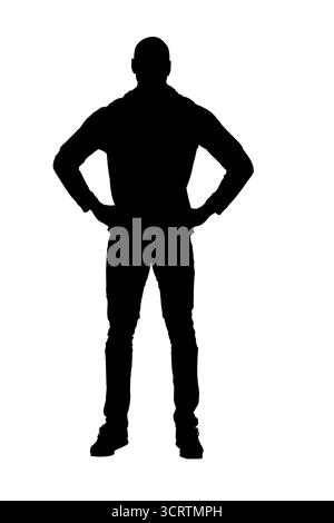 silhouette of   front view portrait of an african man standing and  arms akimbo on white background Stock Photo