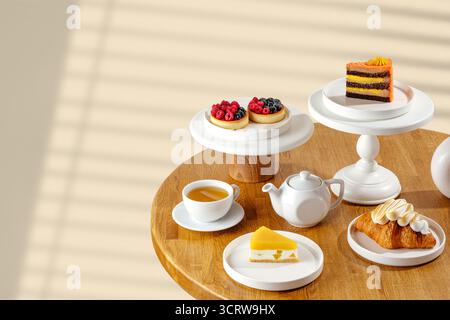 Assorted desserts at a cafe table Stock Photo