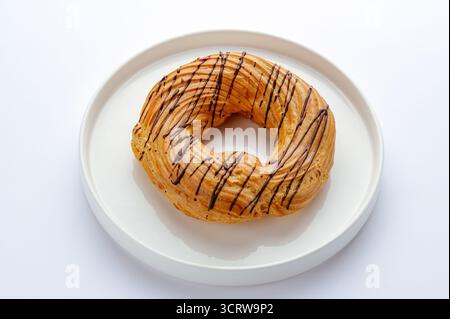 curd ring on a plate with chocolate Stock Photo