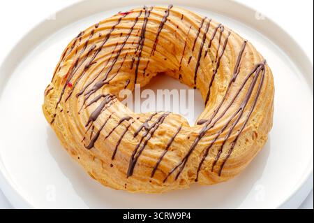 curd ring on a plate with chocolate Stock Photo