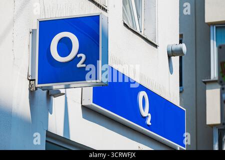 The O2 telecommunications brand logo on the exterior of the shop located in the old city center of Dusseldorf Stock Photo