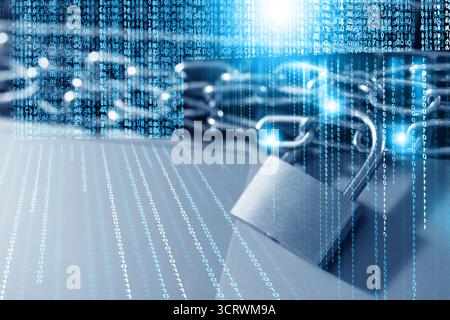 Padlock with chain on laptop, toned in blue. Programming codes. Cyber security Stock Photo