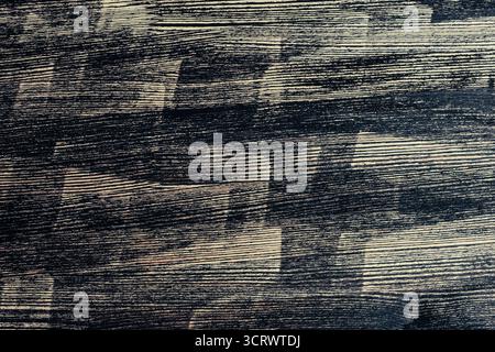 Old painted striped wood plank texture or background, close up. Wooden rough surface Stock Photo