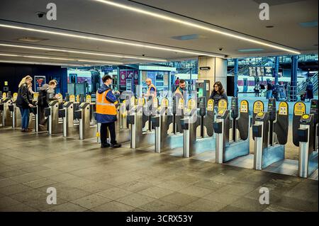 Ticket barriers on Leeds railway station,UK Stock Photo