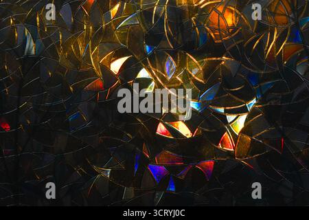 pattern on glass from light a small rainbow will appear on the pattern, pattern on the window Stock Photo