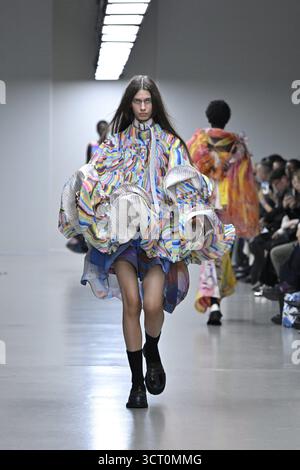 A model is seen on the catwalk at the Anrealage fashion show during ...