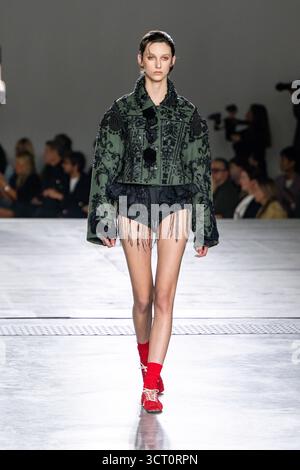 A model is seen on the catwalk at the Dries van Noten fashion show ...