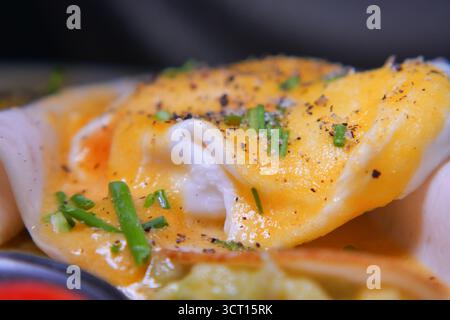 Delicious eggs benedict served on a plate Stock Photo