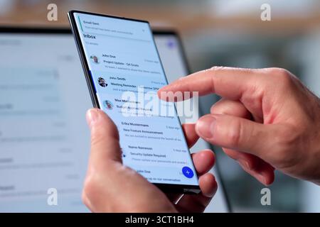 Senior Businessman Working On Email Strategies At Office Desk Stock Photo