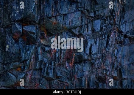 A material with a granite rock texture on the coast of Brittany Stock Photo