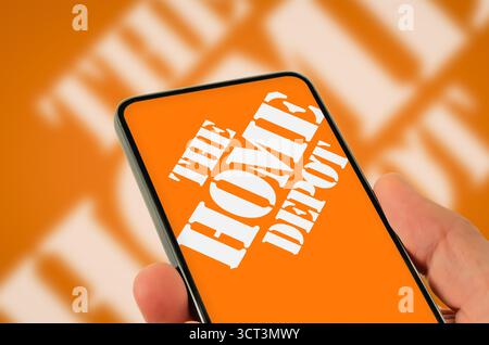 The Home Depot logo displayed on mobile device Stock Photo