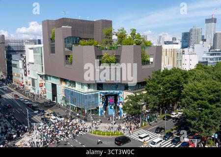 Tokyo, Japan - July 13, 2025: Busy Omotesando shopping district in Tokyo with modern architecture and crowds Stock Photo