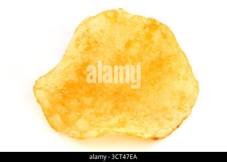 A close up of a potato chip. The chip is golden brown and has a slightly crispy texture Stock Photo