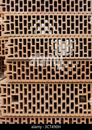 Stacked Poroton bricks showing visible hollow chambers. Close-up. Copyspace. Stock Photo