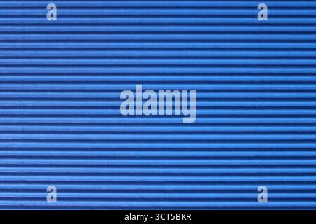 Background and texture, striped blue cardboard, horizontal lines Stock Photo