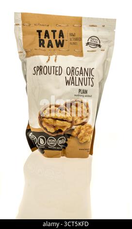 Winneconne, WI - 27 September 2025: A package of Tata Raw sprouted organic walnuts nuts on an isolated background. Stock Photo