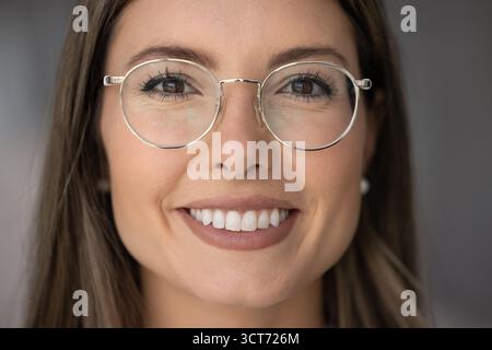 Close up facial portrait of Latin woman looking at camera Stock Photo