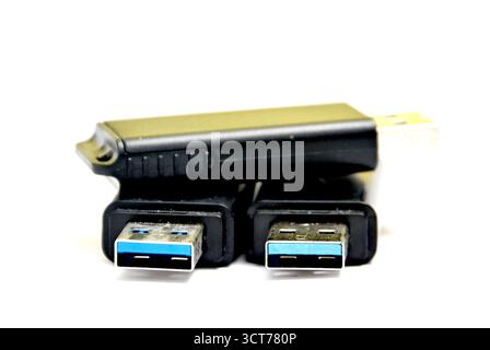 black usb flash drives on a white background. Stock Photo