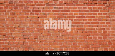 Vintage red brown brick wall texture. Panoramic brick background for your text. Stock Photo
