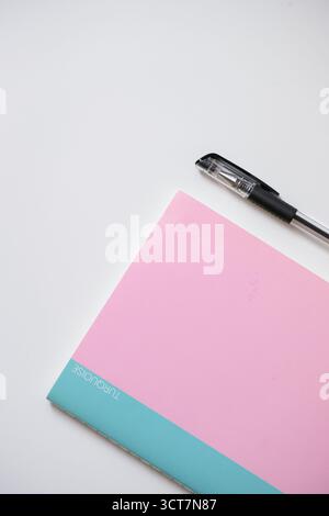 A notebook and a pen isolated on a white background Stock Photo