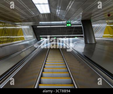 Looking up an Empty Escalator in a Budapest Hungary Subway Transit Station Stock Photo