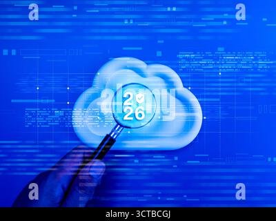 Cloud computing security 2026 concept with magnifying glass on cloud icon and shield symbol over digital blue background. Cloud storage technology, da Stock Photo