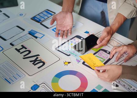 Interactive UX Design Session with Prototypes and Mobile Devices Stock Photo
