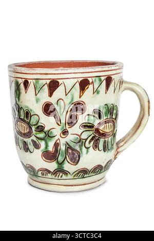 Handmade ceramic painted mug isolated on white background Stock Photo