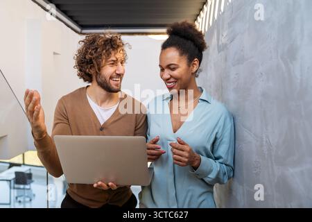 Artificial intelligence, programming innovation. Teamwork with laptops for future solutions Stock Photo