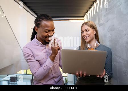 Happy software developers working on meeting, Programming advanced code artificial intelligence. Stock Photo