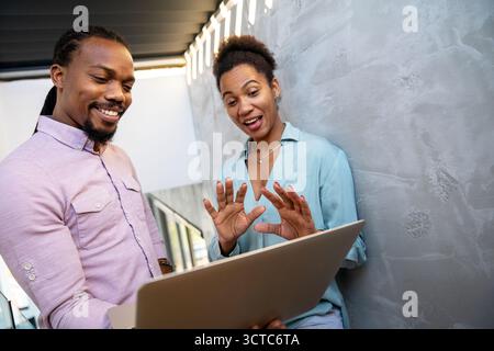 Happy software developers working on meeting, Programming advanced code artificial intelligence. Stock Photo
