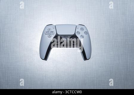 Top Shot white Sony PS5 Playstation Controller on a Resopal plate Stock Photo