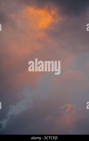 Vibrant Orange and Pink Sunset Clouds in Tropical Sky, Gili Air Stock Photo