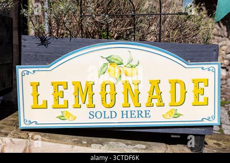 Lemonade sold here sign, Lemonade sold here, Lemonade, Lemonade sign, sign, rustic, rustic sign, wooden sign, hand painted sign, hand painted, rustic, Stock Photo