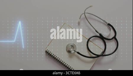 Featuring stethoscope resting on spiral notebook at desk, with cyan heartbeat and dot grid overlays Stock Photo